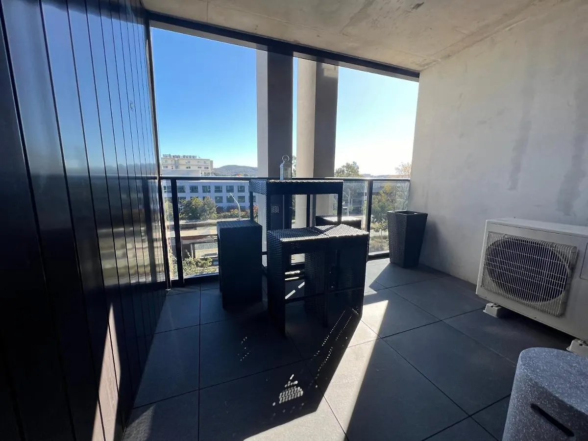 Midnight Luxe: Chic Braddon Apartment with Pool and City Views Canberra